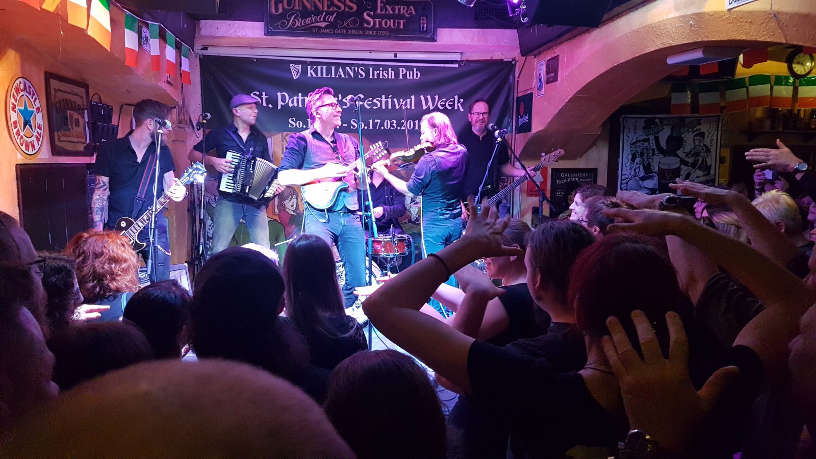 The crowd dancing to live music at Kilians