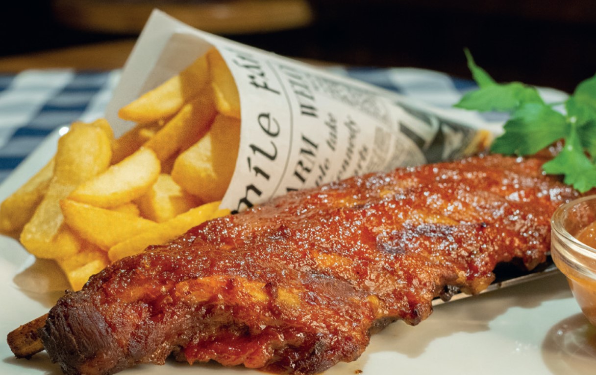 Barbecue spareribs served with chips at Ned Kelly's